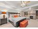 The main bedroom suite features tray ceilings, a fireplace, built-in shelving, and a sitting area at 3127 Lenox Ne Rd # 20, Atlanta, GA 30324