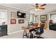 Comfortable home office with a ceiling fan, desk, computer, and decor at 3127 Lenox Ne Rd # 20, Atlanta, GA 30324