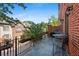 Cozy brick patio with outdoor seating, a grill, and greenery, perfect for entertaining at 3127 Lenox Ne Rd # 20, Atlanta, GA 30324