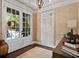Cozy study featuring patterned wallpaper, French doors, and shuttered windows at 3127 Lenox Ne Rd # 20, Atlanta, GA 30324