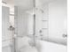 Sleek bathroom with mirrored walls, showcasing a glass-enclosed shower over tub at 3338 Peachtree Ne Rd # 3102, Atlanta, GA 30326