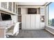 Stylish bedroom showcasing a Murphy bed, a desk, and custom built-in storage at 3338 Peachtree Ne Rd # 3102, Atlanta, GA 30326