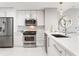 Sleek kitchen boasts stainless appliances, ample cabinet space, and an open design at 3338 Peachtree Ne Rd # 3102, Atlanta, GA 30326