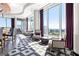 Bright lounge area with floor-to-ceiling windows, comfortable seating, and stylish decor, ideal for relaxation and socializing at 3338 Peachtree Ne Rd # 3102, Atlanta, GA 30326