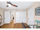 Bedroom showcasing closet space and a ceiling fan fixture at 5105 Chemin De Vie, Atlanta, GA 30342