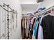 Walk-in closet with built-in shelving and ample space for clothing and accessories at 5105 Chemin De Vie, Atlanta, GA 30342