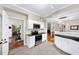 Updated kitchen featuring stainless appliances, stone counters, and an open design at 5105 Chemin De Vie, Atlanta, GA 30342