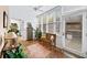 Sunroom featuring lots of light from windows, tile floor, and seating at 5105 Chemin De Vie, Atlanta, GA 30342