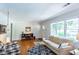 Inviting living room featuring hardwood floors, lots of light, and a comfortable seating area at 2469 Hunting Valley Dr, Decatur, GA 30033