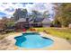 Lovely backyard pool with a gazebo and the home in the background at 2636 Harvest Se Dr, Conyers, GA 30013