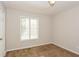 Cozy bedroom featuring neutral walls, plush carpet, and a window at 3790 Willow Ridge Rd, Douglasville, GA 30135