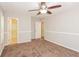 Spacious bedroom with neutral walls, ceiling fan, and carpeted floor at 3790 Willow Ridge Rd, Douglasville, GA 30135