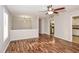 Sunlit living space with hardwood floors and an open layout leading to the kitchen at 3790 Willow Ridge Rd, Douglasville, GA 30135