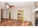 Open-concept living area with hardwood floors, flowing into the dining and kitchen spaces at 3790 Willow Ridge Rd, Douglasville, GA 30135