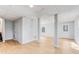 Spacious basement is painted light grey with wood floors and white trim at 5465 N Fork Sw Dr, Lilburn, GA 30047
