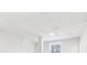 Finished basement has wood floors, a drop ceiling, and light grey walls at 5465 N Fork Sw Dr, Lilburn, GA 30047