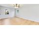 Bedroom with wood floors and two windows providing natural light at 5465 N Fork Sw Dr, Lilburn, GA 30047
