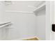 This walk-in closet is complete with shelves and a rod at 5465 N Fork Sw Dr, Lilburn, GA 30047