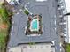 Aerial view of a modern apartment complex featuring a pool and well-maintained grounds at 747 Ralph Mcgill Ne Blvd # 223, Atlanta, GA 30312