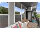 Enjoy outdoor living on this tiled balcony with stylish furniture and a view of the surroundings at 747 Ralph Mcgill Ne Blvd # 223, Atlanta, GA 30312