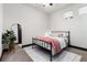 Cozy bedroom with a patterned rug, stylish mirror, and a comfortable-looking bed at 747 Ralph Mcgill Ne Blvd # 223, Atlanta, GA 30312