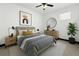 Bedroom featuring neutral decor, bedside tables, ceiling fan, and window at 747 Ralph Mcgill Ne Blvd # 223, Atlanta, GA 30312