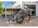 Eye-catching metal bull sculpture in front of the Shake Shack at 747 Ralph Mcgill Ne Blvd # 223, Atlanta, GA 30312
