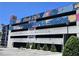 View of the apartment building garage with colorful painted banners at 747 Ralph Mcgill Ne Blvd # 223, Atlanta, GA 30312