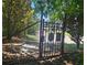 View of the gated entrance with black metal fencing at 747 Ralph Mcgill Ne Blvd # 223, Atlanta, GA 30312