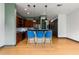 Open concept kitchen with bar seating, stainless steel appliances, and dark wood cabinetry at 747 Ralph Mcgill Ne Blvd # 223, Atlanta, GA 30312