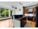 Modern kitchen island and hardwood floors at 747 Ralph Mcgill Ne Blvd # 223, Atlanta, GA 30312