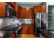 Modern kitchen with stainless steel appliances and granite countertops at 747 Ralph Mcgill Ne Blvd # 223, Atlanta, GA 30312