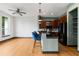 Open kitchen layout with breakfast bar seating, pendant lighting, and stainless steel appliances at 747 Ralph Mcgill Ne Blvd # 223, Atlanta, GA 30312