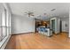 Bright and open-concept living space with hardwood floors, stainless appliances, and a modern kitchen at 747 Ralph Mcgill Ne Blvd # 223, Atlanta, GA 30312