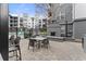 Charming patio with a fireplace and comfortable seating, perfect for outdoor entertaining at 747 Ralph Mcgill Ne Blvd # 223, Atlanta, GA 30312