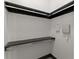 Bright walk-in closet featuring black metal hardware and shelving units at 747 Ralph Mcgill Ne Blvd # 223, Atlanta, GA 30312