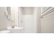 Clean and bright bathroom featuring a shower-tub combination, a modern sink, and sleek fixtures at 1667 Hollyhock Ter, Decatur, GA 30032