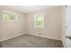 Bright, cozy bedroom with neutral carpet and walls, offering a calming atmosphere at 1667 Hollyhock Ter, Decatur, GA 30032