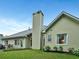 Lovely backyard with manicured lawn, patio, and view of the home's exterior at 59 Sentry Rdg, Dallas, GA 30157
