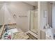 Bathroom with granite countertop, glass shower, and neutral color palette at 59 Sentry Rdg, Dallas, GA 30157