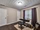 Bedroom featuring hardwood floors, natural light, and space for musical instruments at 59 Sentry Rdg, Dallas, GA 30157