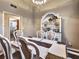 Dining room featuring chandelier, neutral colors and dining set at 59 Sentry Rdg, Dallas, GA 30157