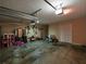 Large garage interior with storage shelves and space for multiple vehicles at 59 Sentry Rdg, Dallas, GA 30157