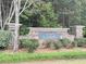 Stone community welcome sign with 'Legacy at St. Joseph's' engraved on a blue plate at 7431 St David St, Fairburn, GA 30213
