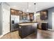 Well-equipped kitchen featuring stainless steel appliances, granite countertops, and a center island at 924 Woodbury Rd, Canton, GA 30114