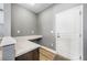 Mudroom features a counter and storage space, a convenient spot to organize at 924 Woodbury Rd, Canton, GA 30114