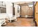 Charming backyard deck with rocking chairs and hanging swing chairs at 1058 Mays Sw Hl, Atlanta, GA 30336