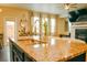 Gourmet kitchen with granite countertops, stainless steel appliances, and a kitchen island at 1058 Mays Sw Hl, Atlanta, GA 30336