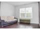 Cozy living room with hardwood floors and bright window views at 1058 Mays Sw Hl, Atlanta, GA 30336