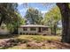 Charming single-story home featuring a well-maintained lawn and mature trees at 1089 Greenleaf Se Rd, Atlanta, GA 30316